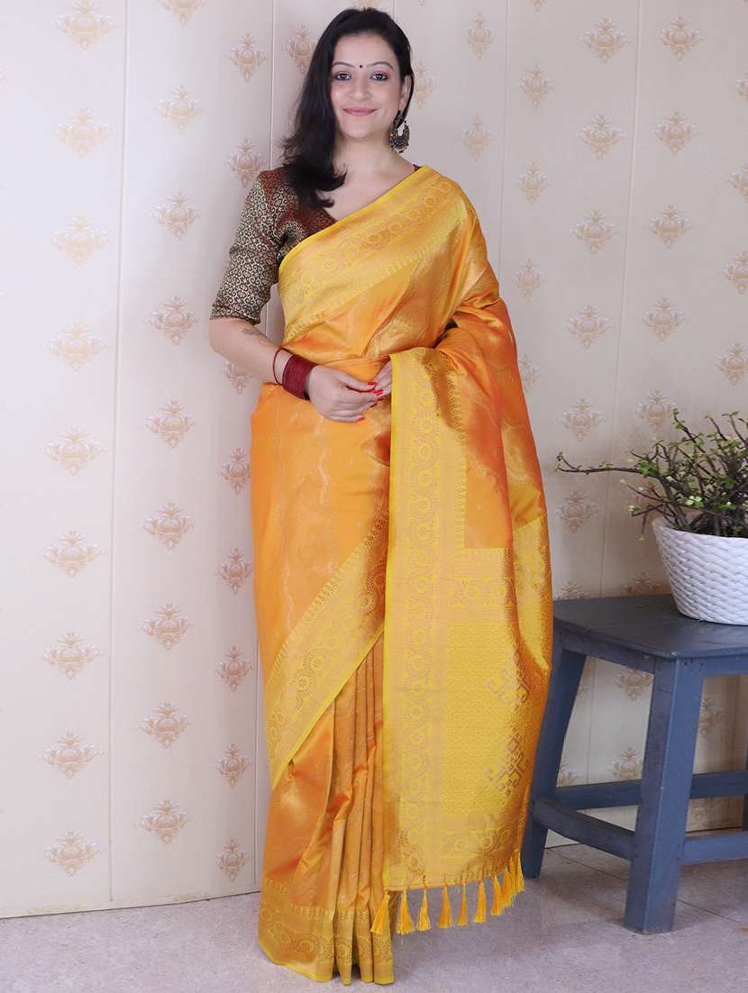 women self design banarasi saree with blouse