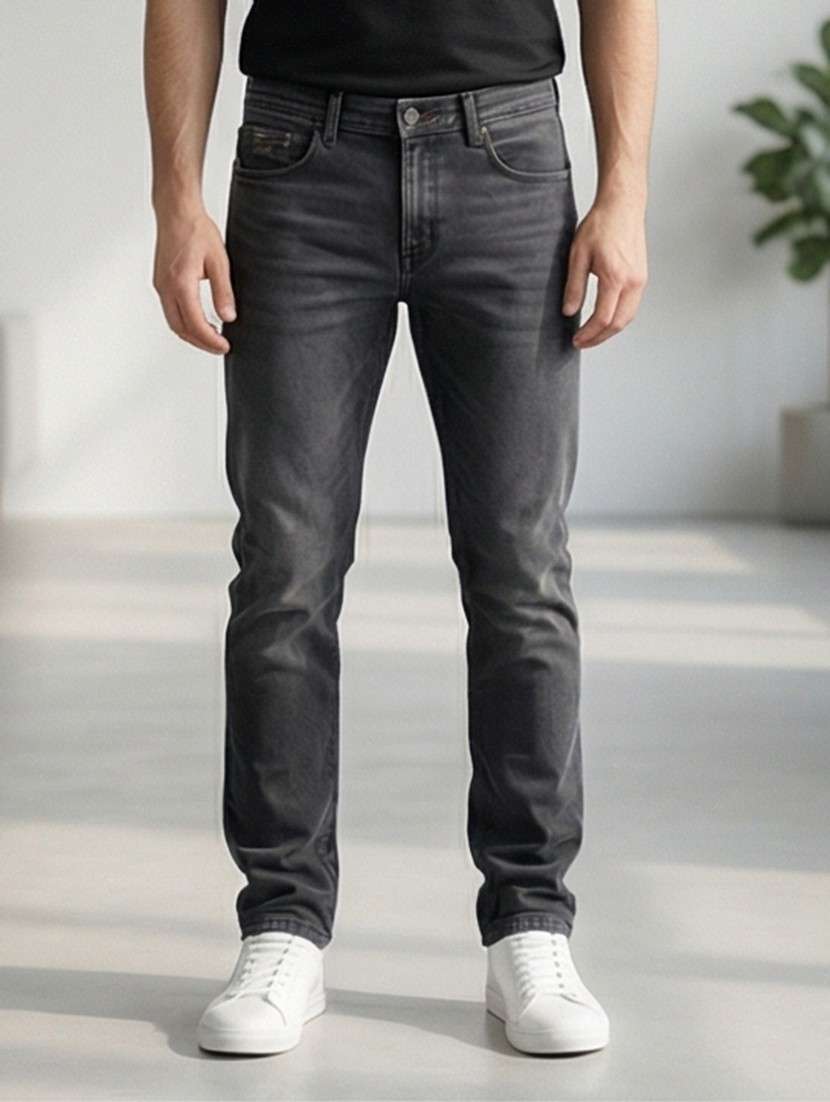 men washed high rise full length tapered jeans