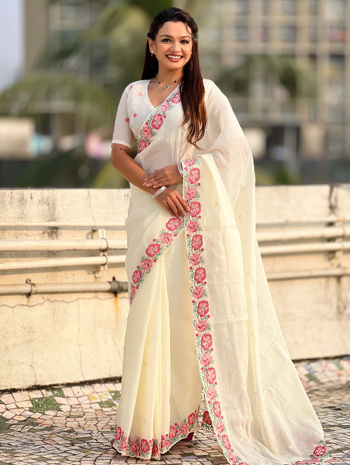 women solid with work embroidered saree with blouse