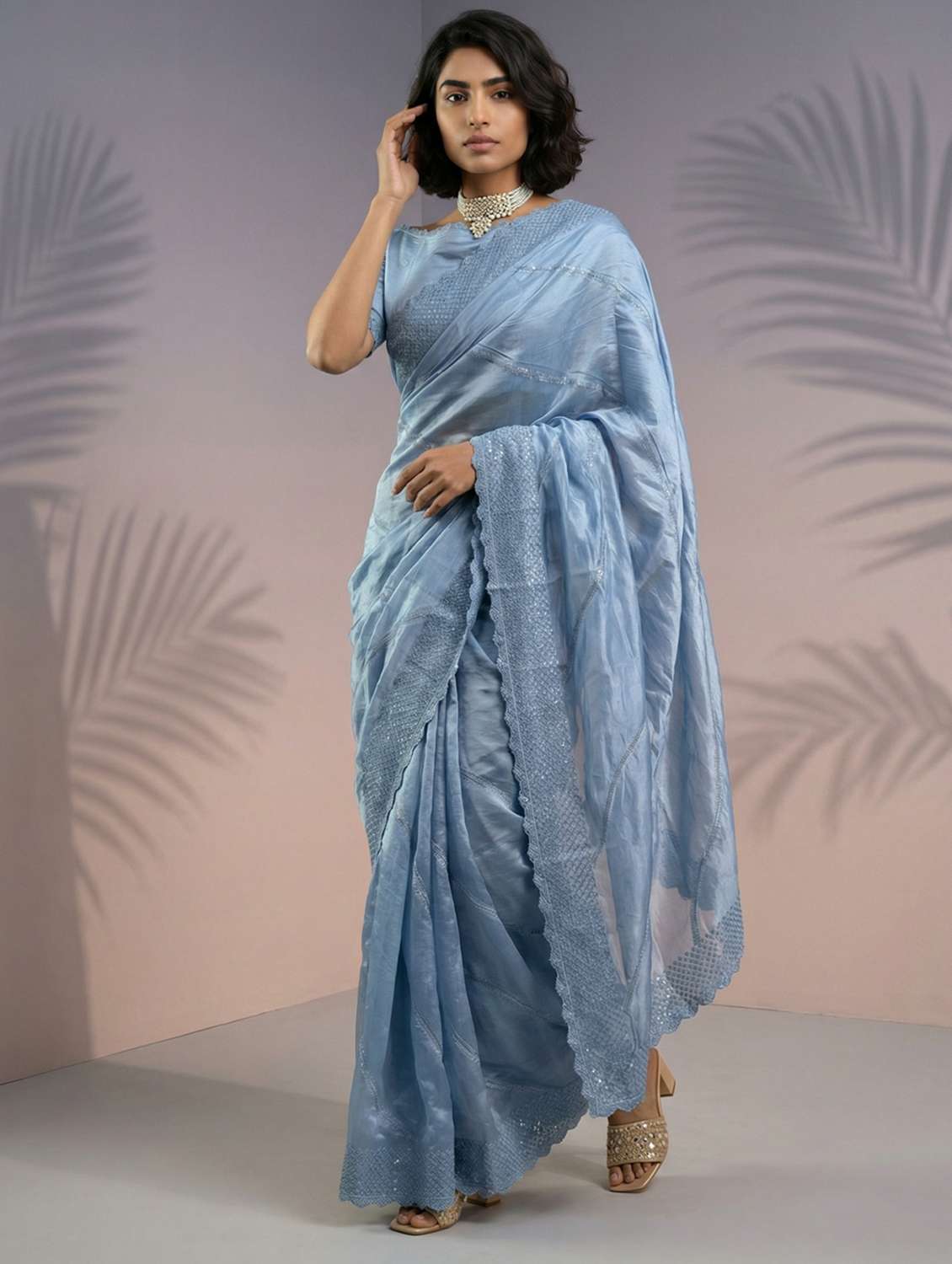 women solid with work embroidered saree with blouse