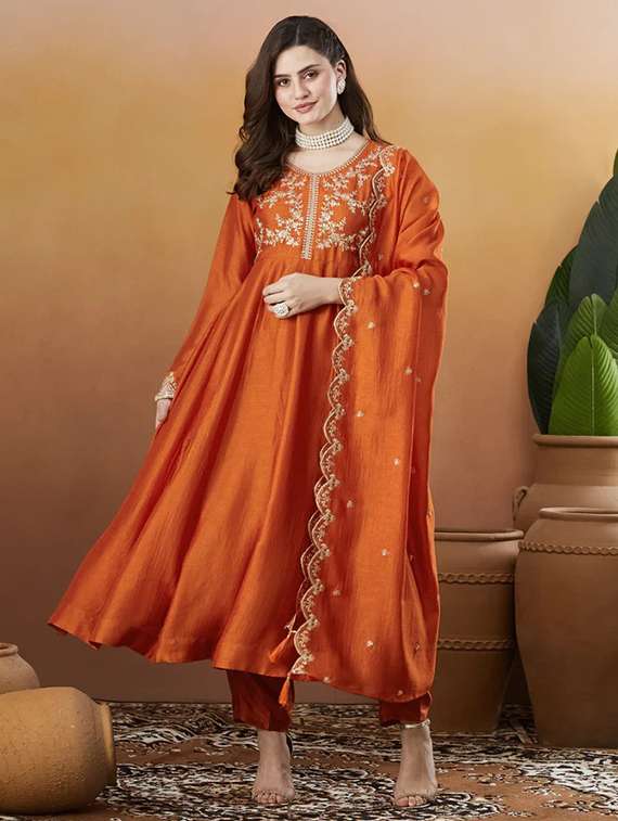 women rust self design  kurta pant set
