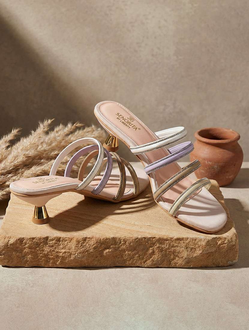 women cream slip on sandal