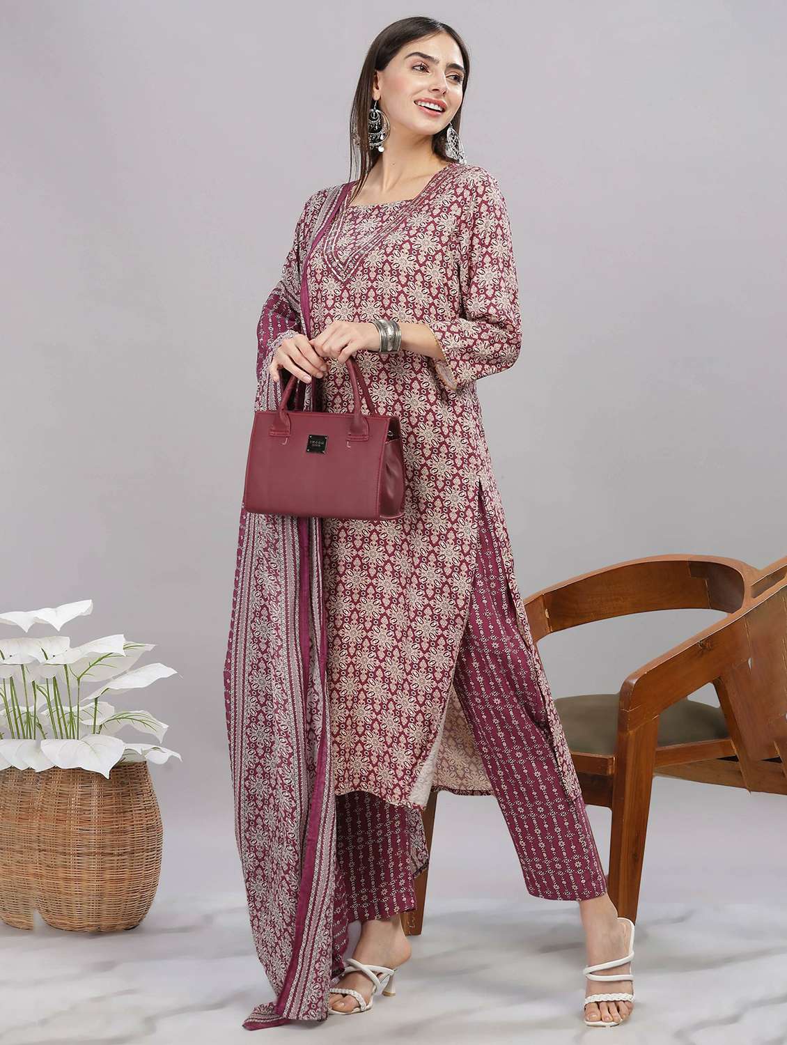 women self design maroon suit set