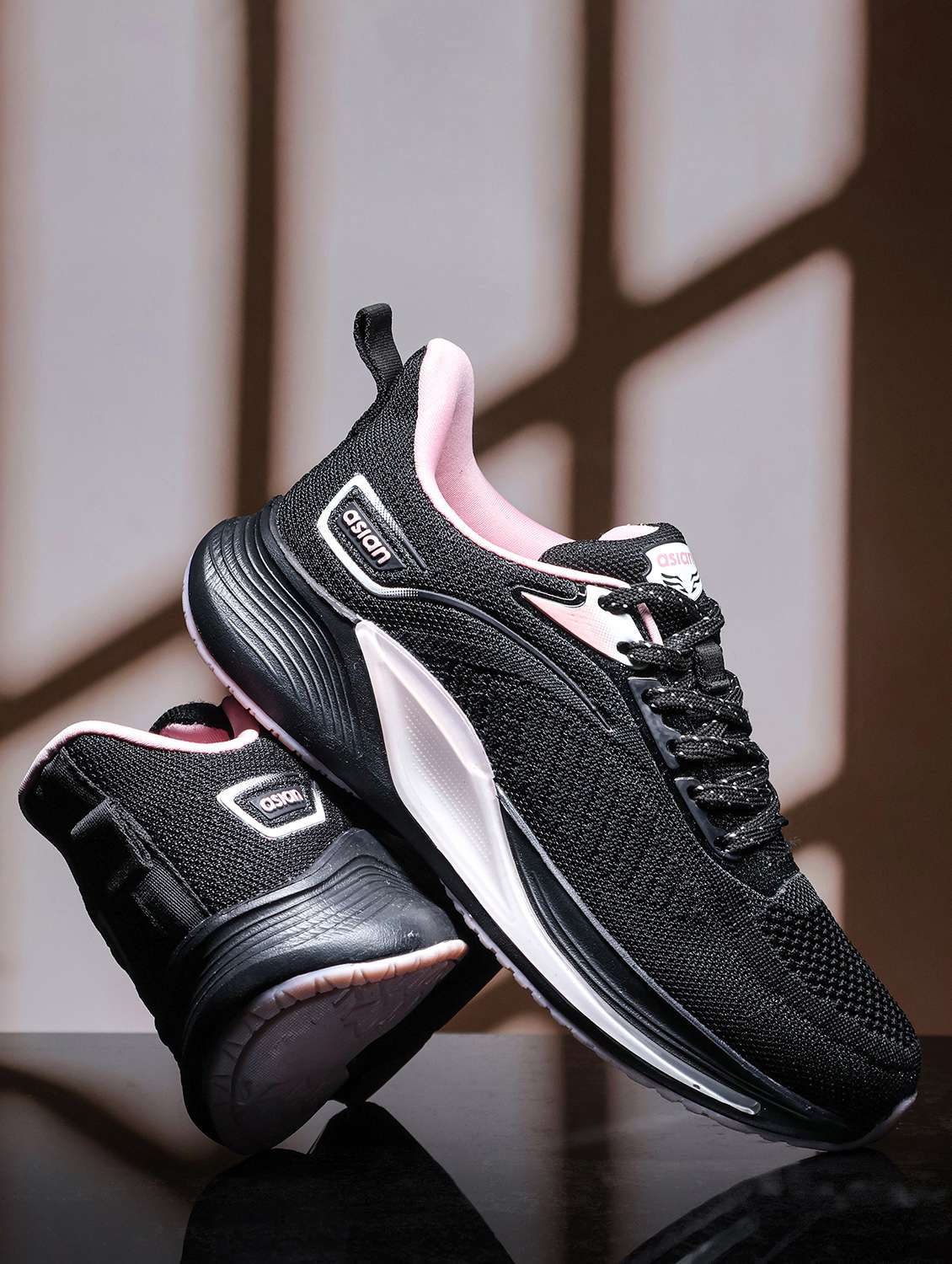 women black lace-up sports shoe