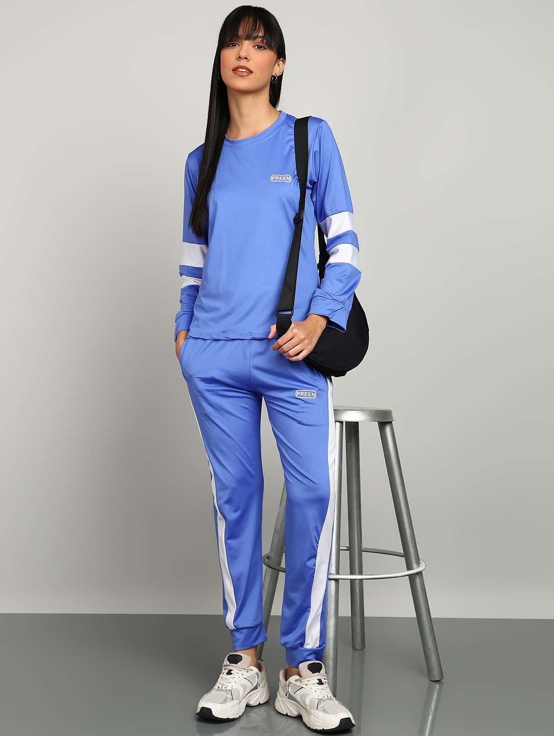 women blue polyester solid active wear set