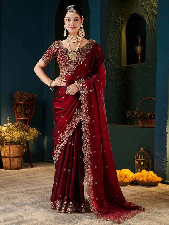 women solid with work embellished saree with blouse
