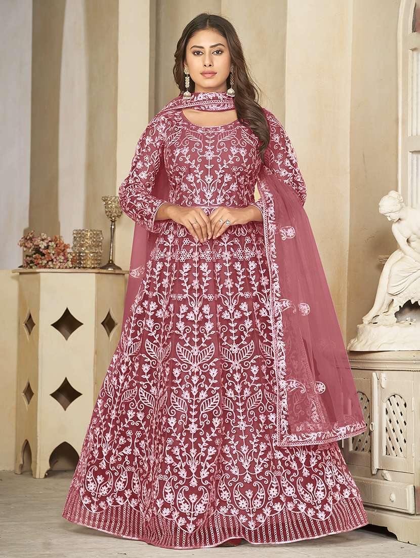 women solid with work semi stitched suit set