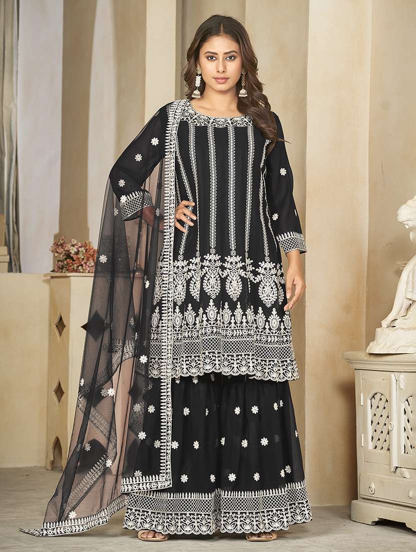 women solid with work semi stitched suit set