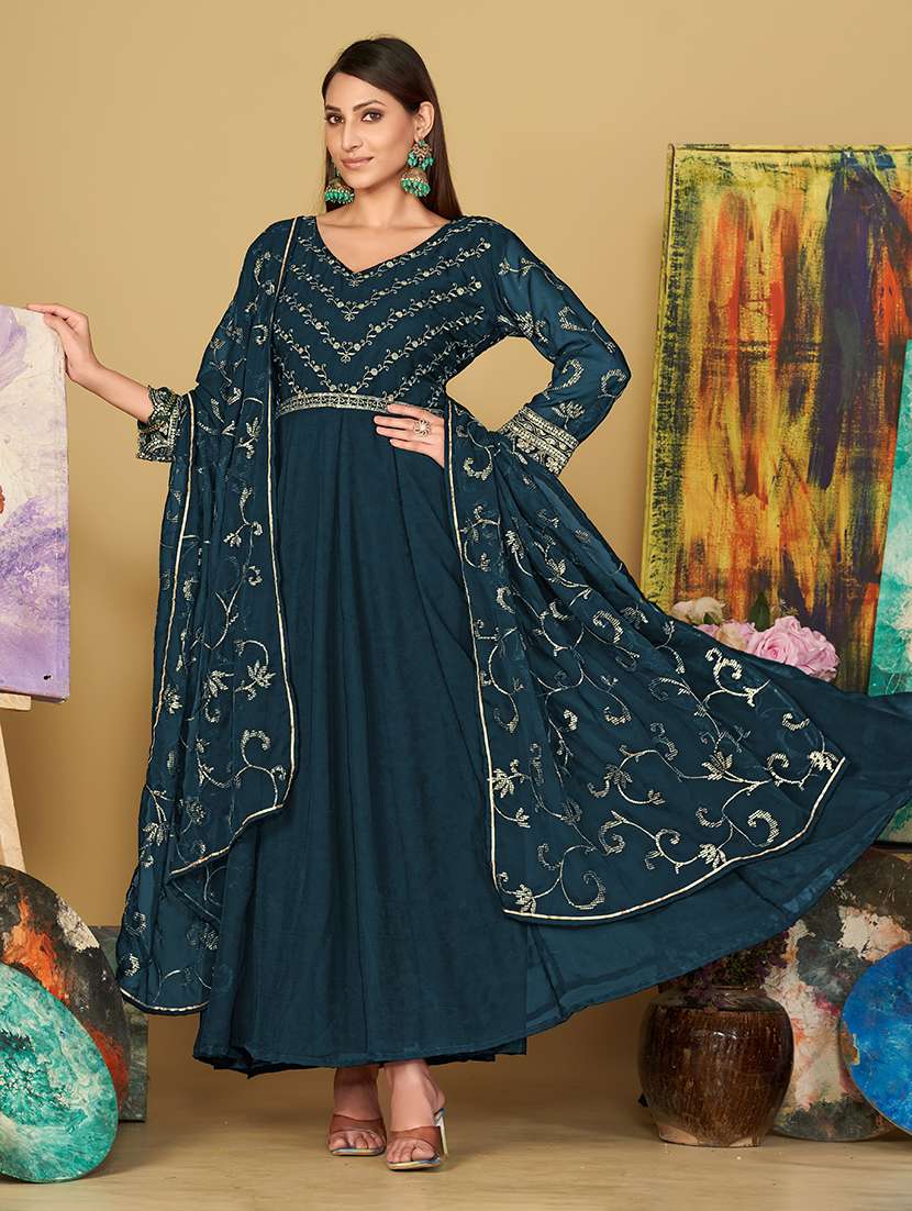 women solid with work semi stitched suit set