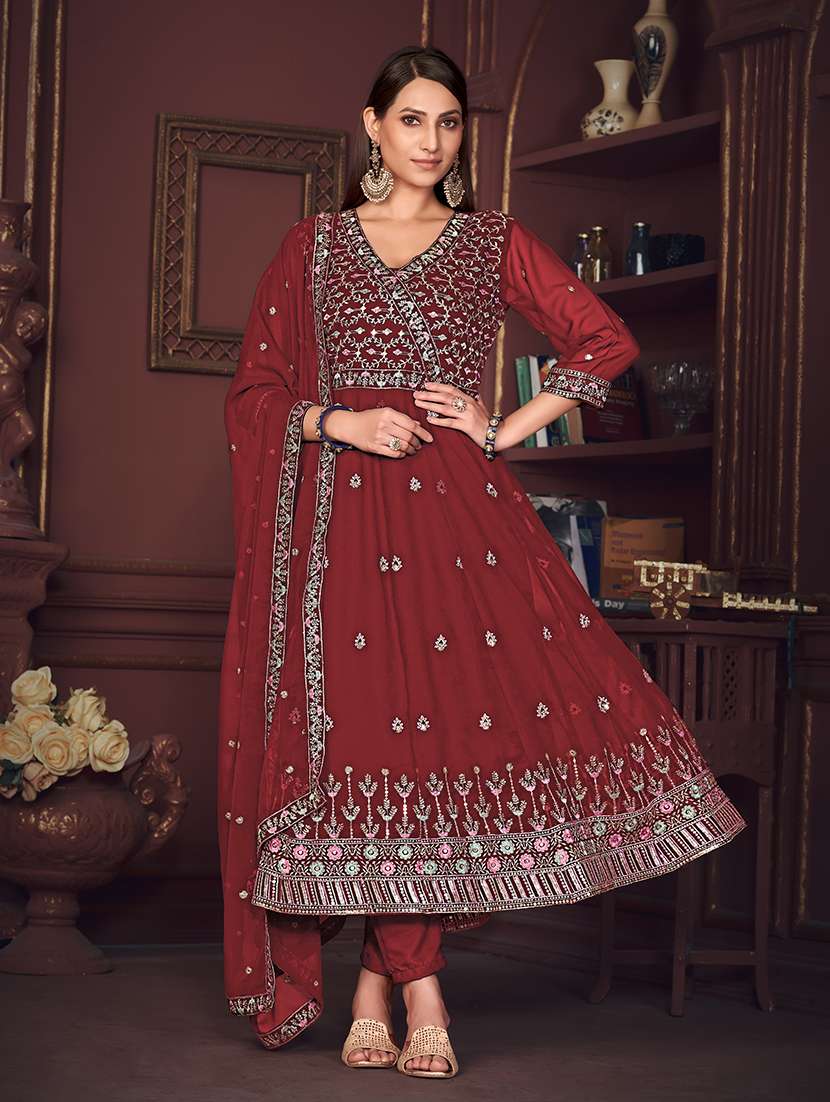 women solid with work semi stitched suit set