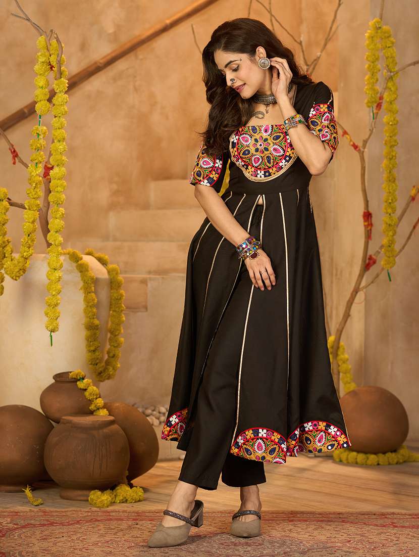women self design black top pants set