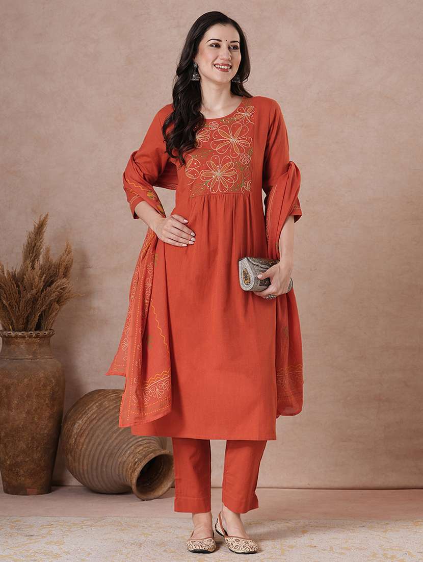 women orange kurta dupatta set