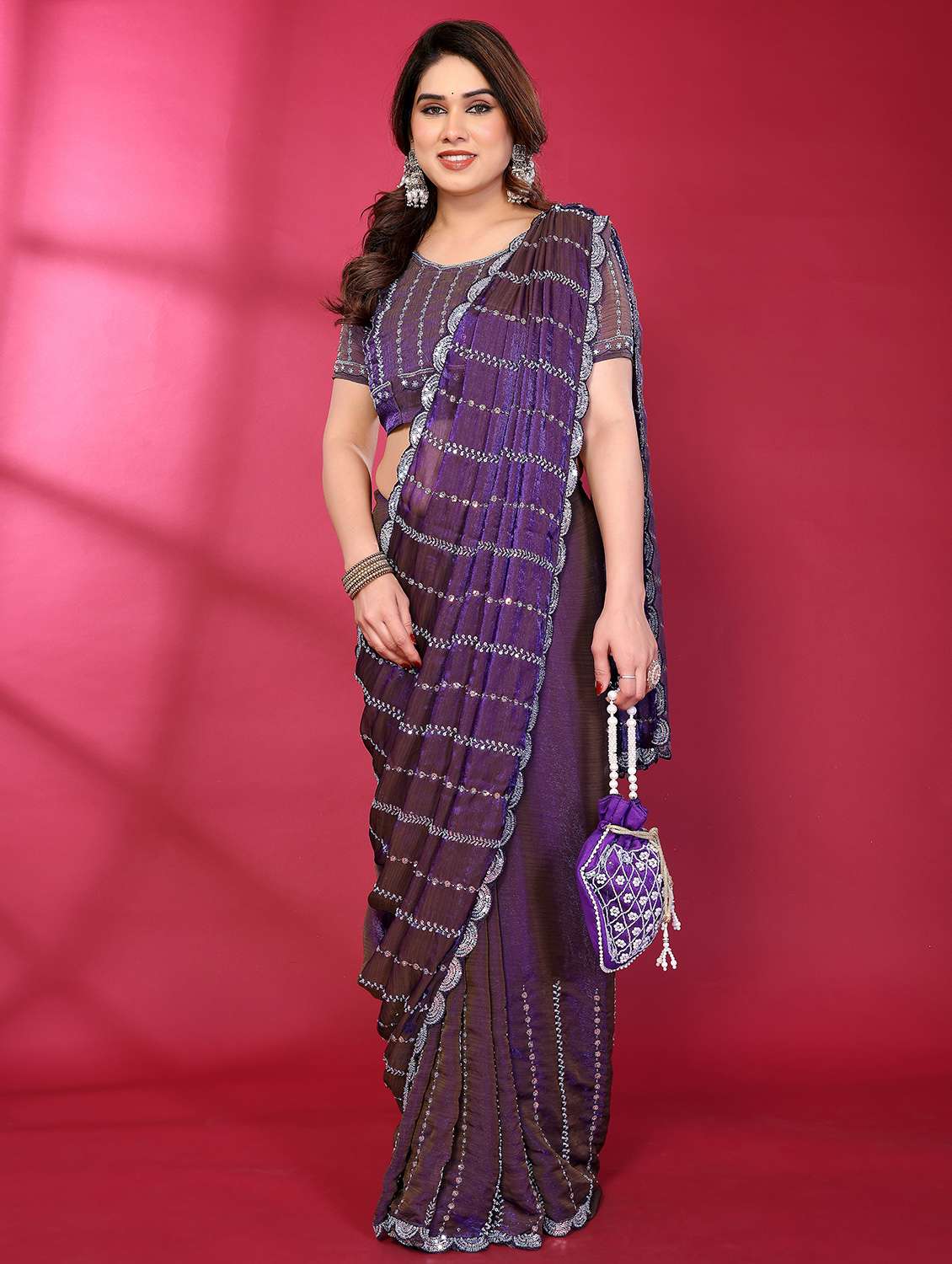 women solid with work embroidered saree with blouse