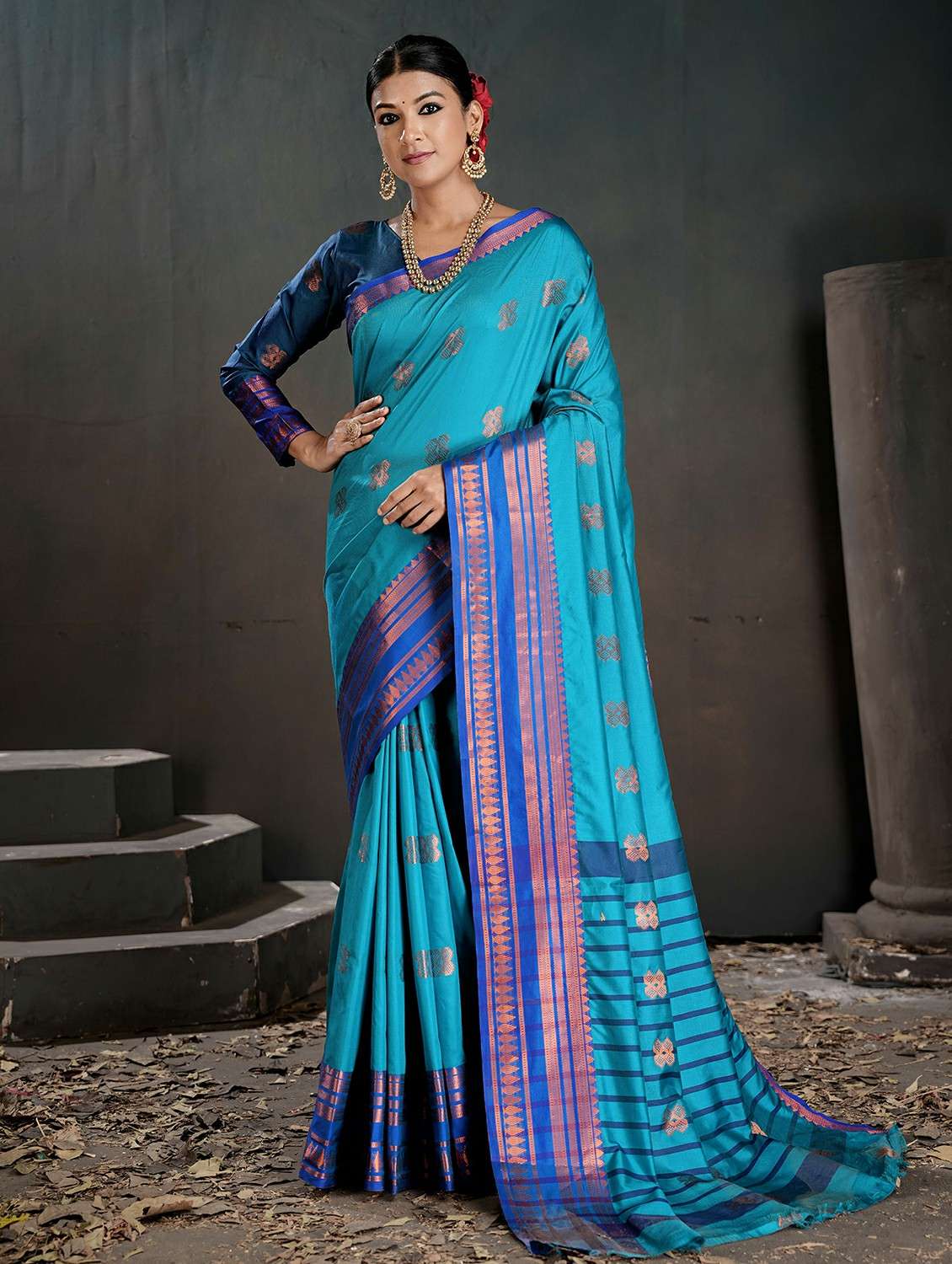 women blue embellished saree with blouse