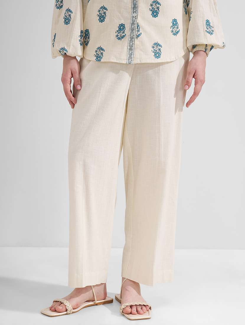 women beige relaxed fit cotton solid trousers