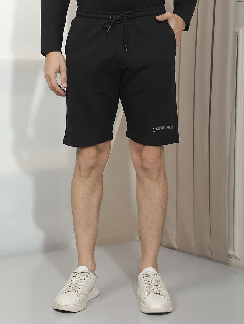men solid mid rise regular fit sport shorts