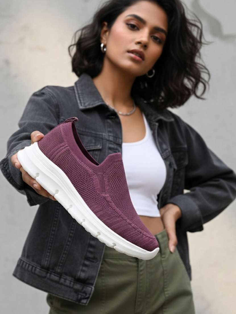 women purple slip on sports shoe