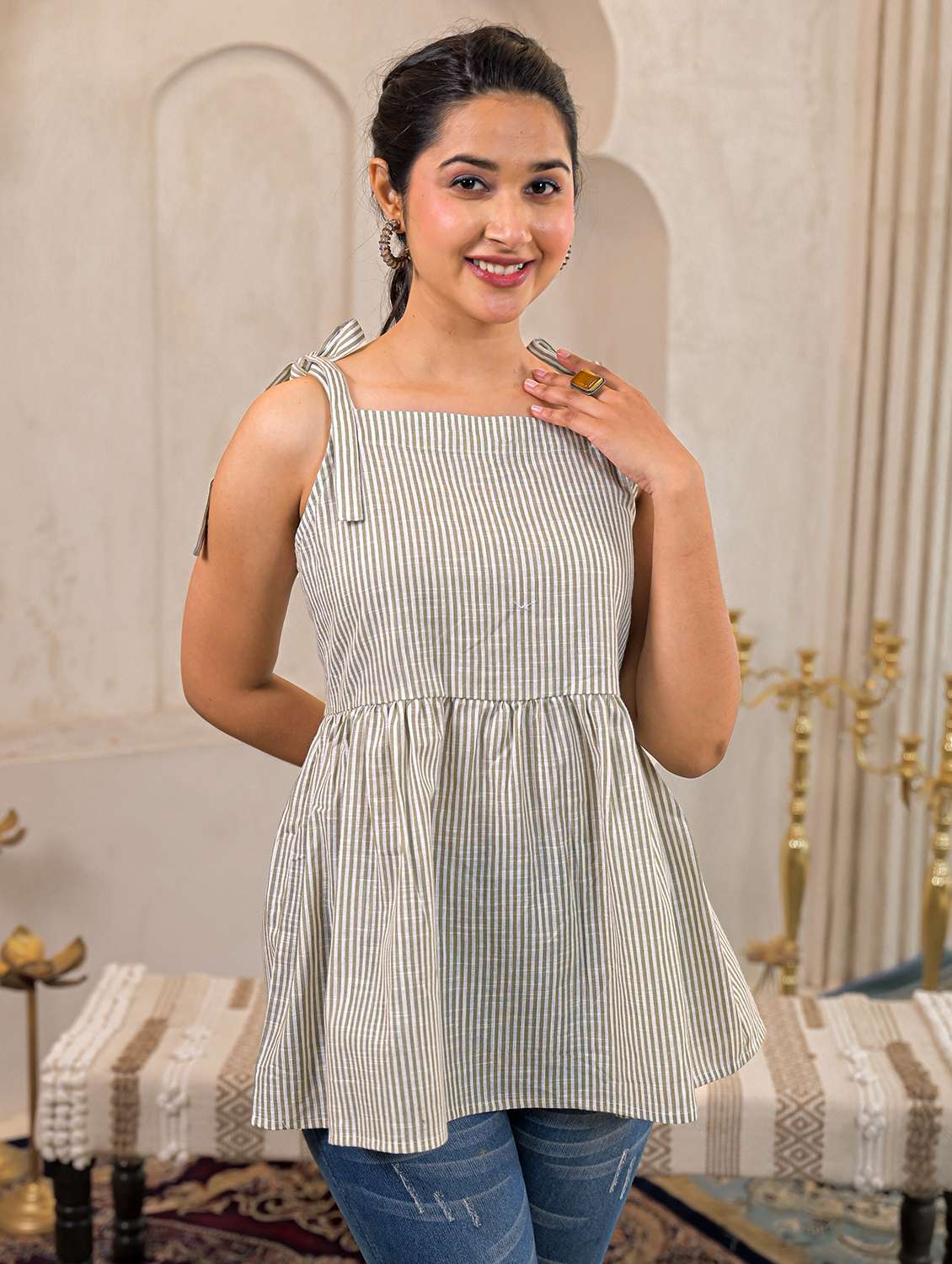 women striped peplum sleeveless top