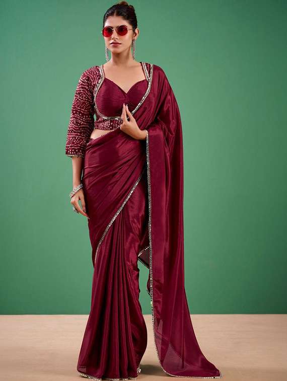 women solid with embellished bordered saree with blouse