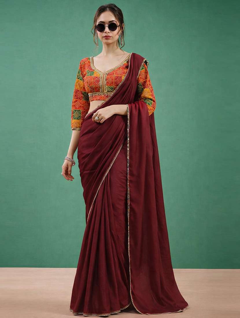 women solid with bordered saree with blouse