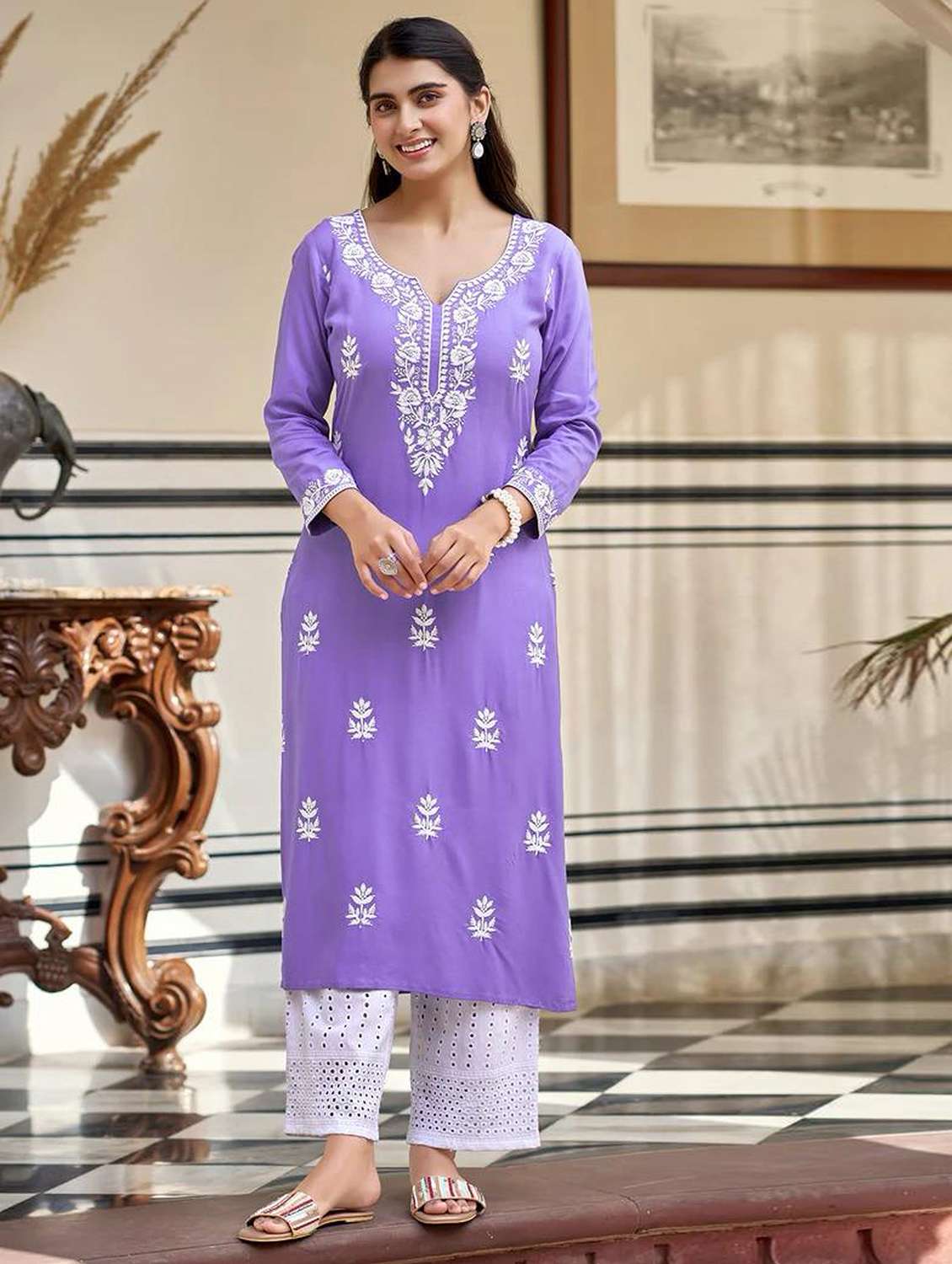 women embroidered notch neck kurta and pant set