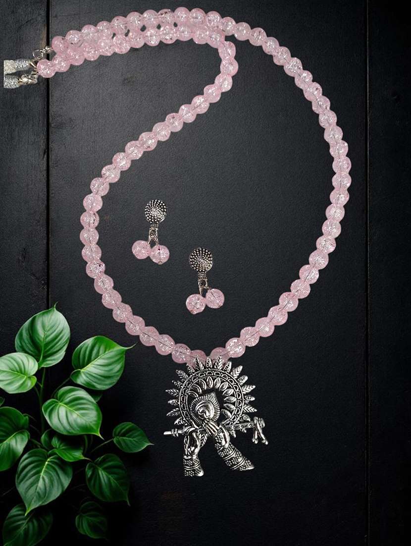 pink necklace and earrings set with oxidized pendant