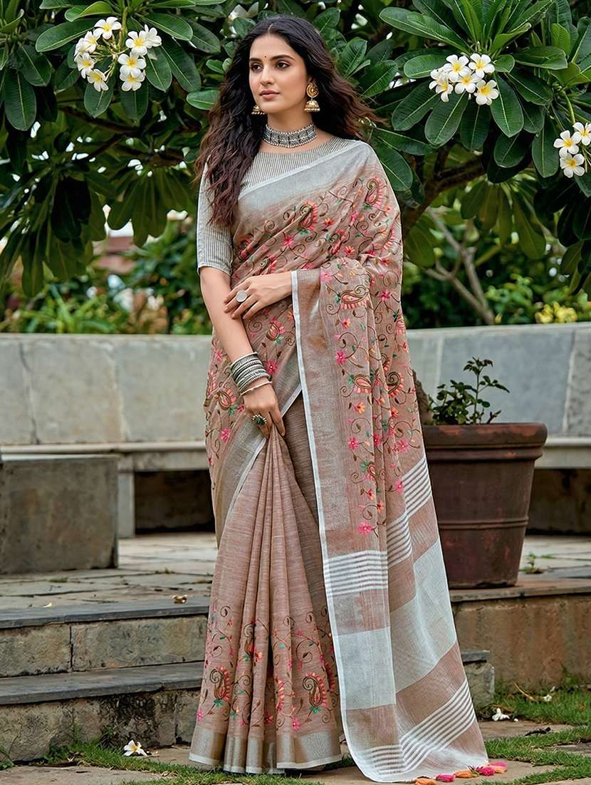 women solid with work embroidered saree with blouse
