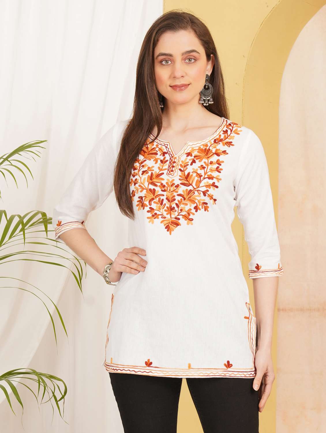 women embroidered three quarter sleeve straight kurti