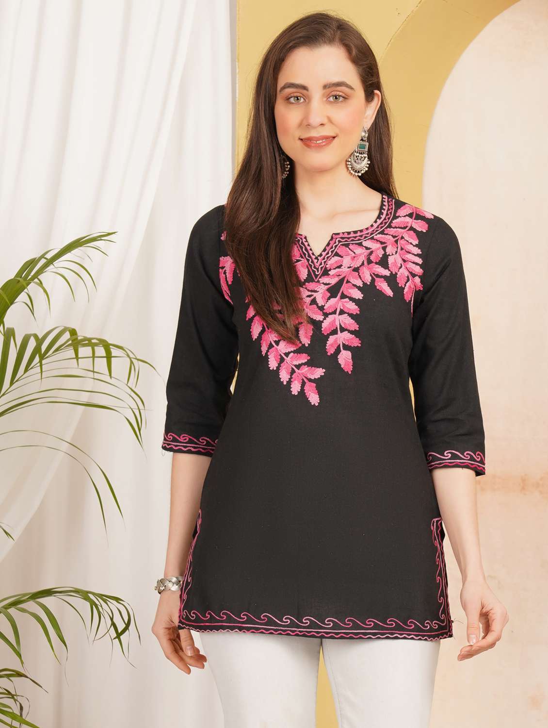 women embroidered three quarter sleeve straight kurti
