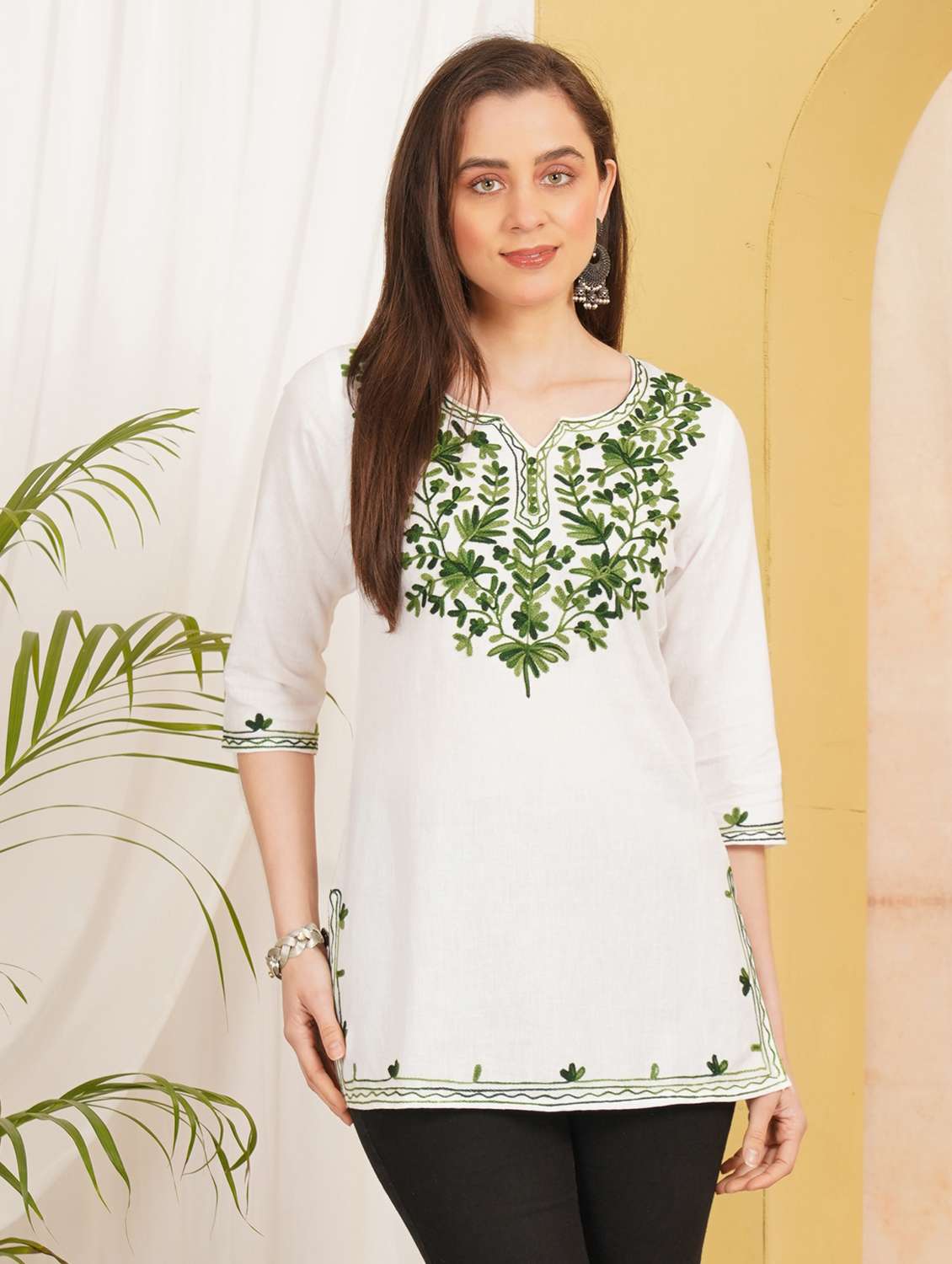 women embroidered three quarter sleeve straight kurti