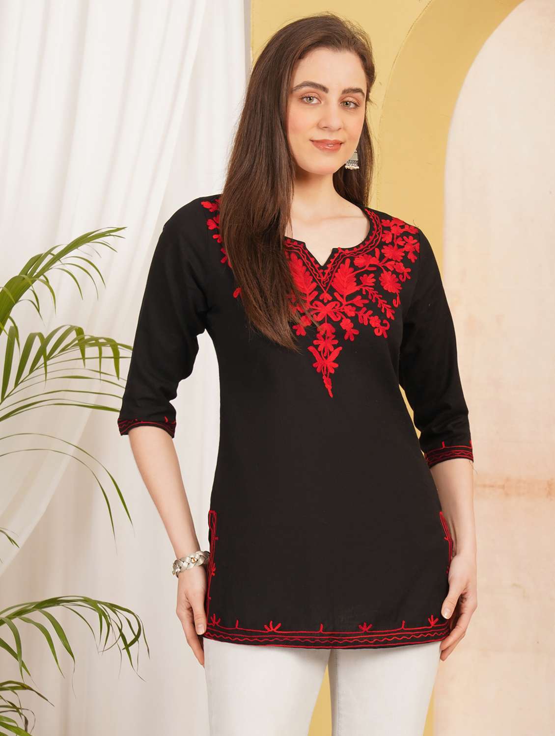women embroidered three quarter sleeve straight kurti