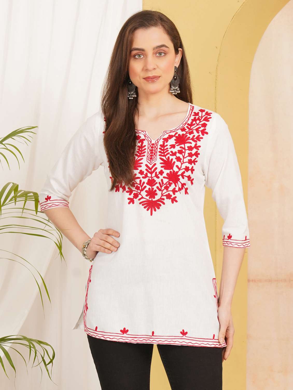 women embroidered three quarter sleeve straight kurti