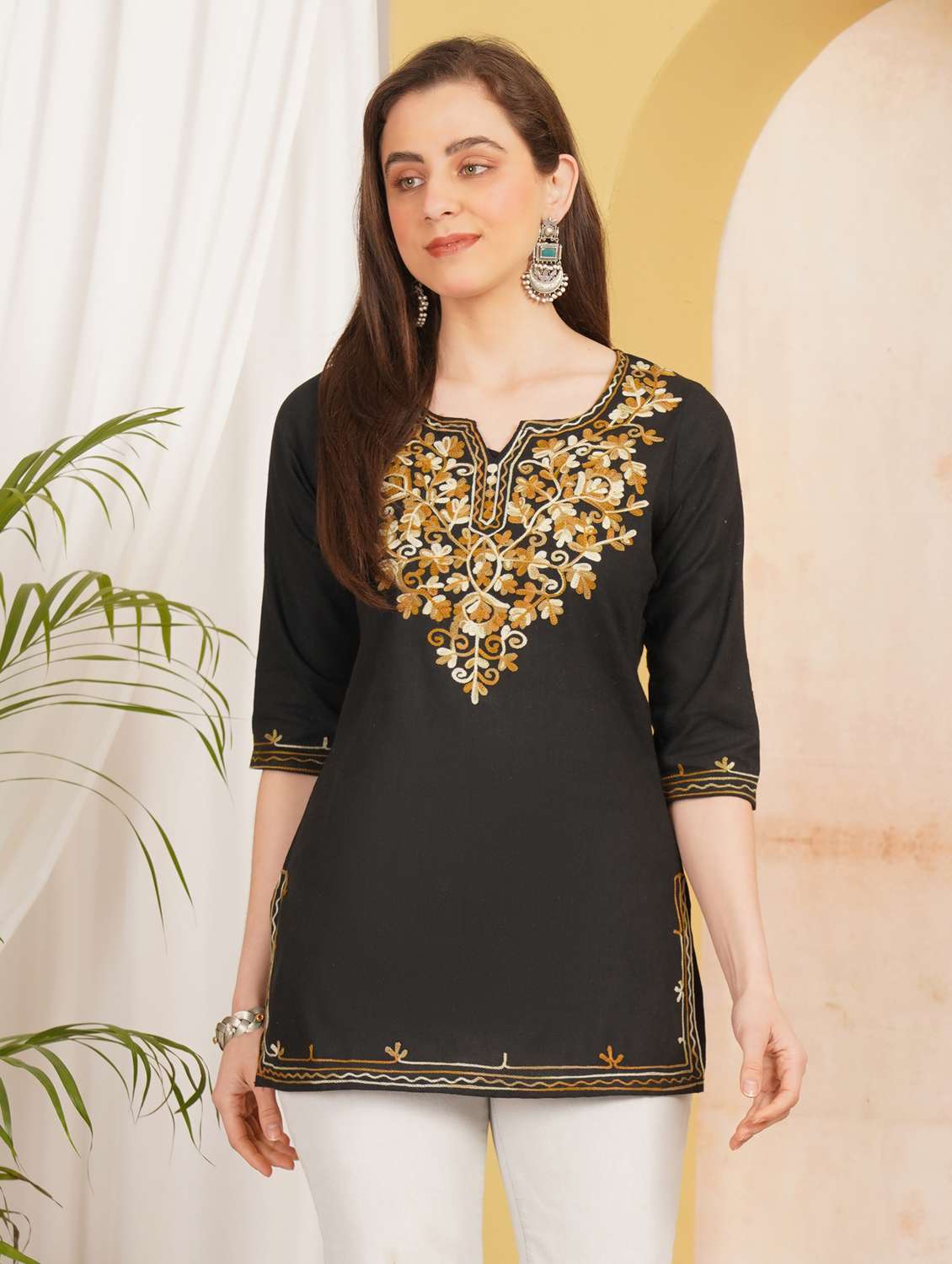 women embroidered three quarter sleeve straight kurti