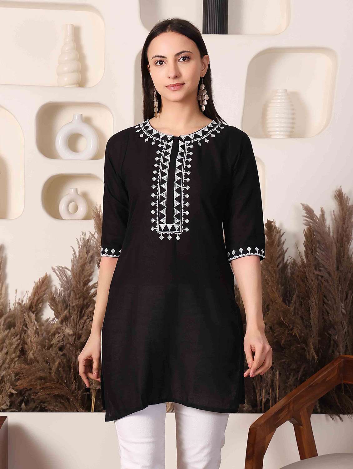 women embroidered three quarter sleeve straight kurti