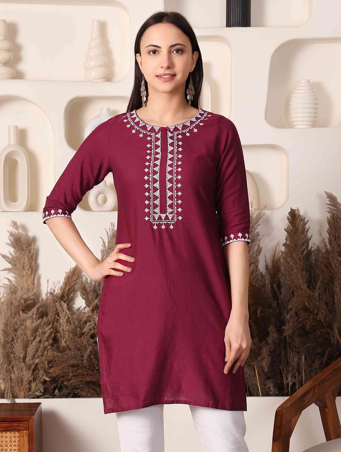 women embroidered three quarter sleeve straight kurti