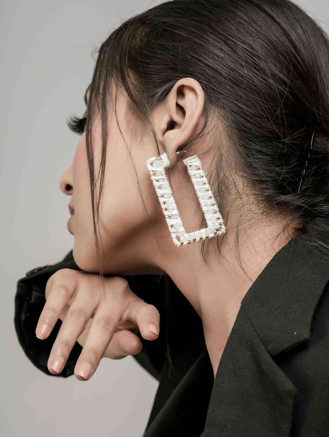 geometric dangle earrings with beaded detailing