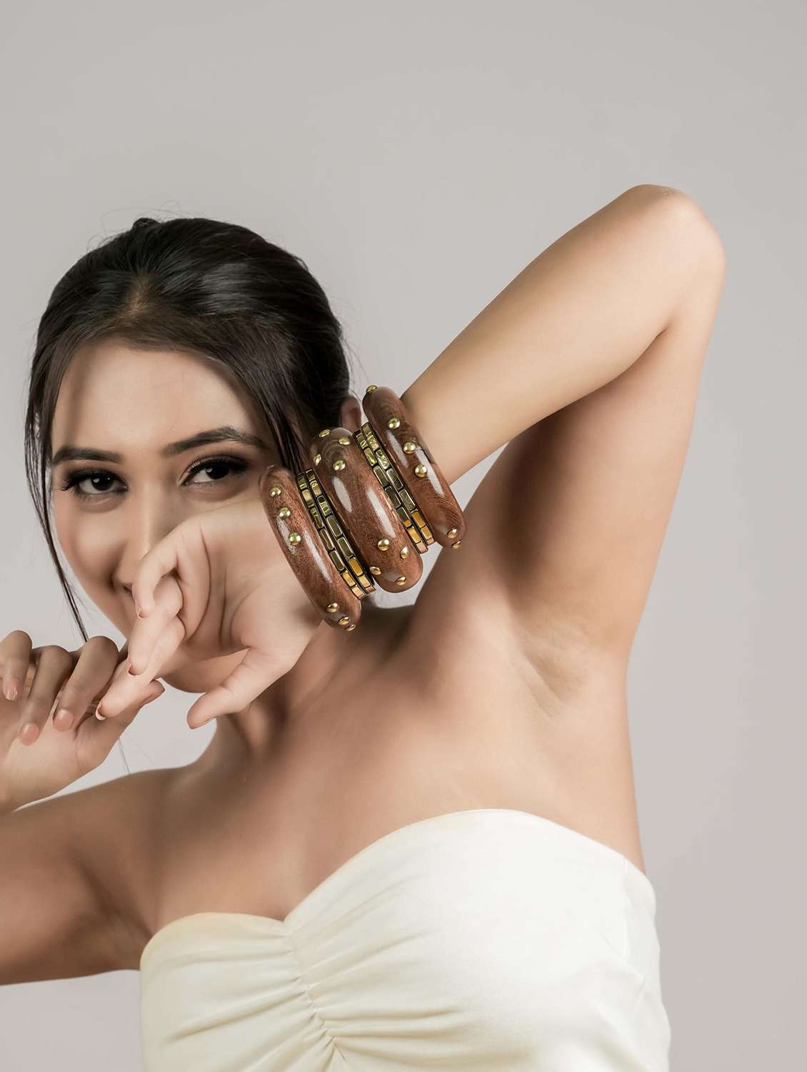 handcrafted brown wood bangles with metal detailing (set of 7) - 22498198 -  Standard Image - 5
