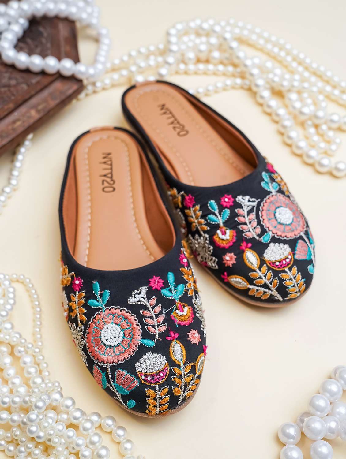women embroidered slip on mules