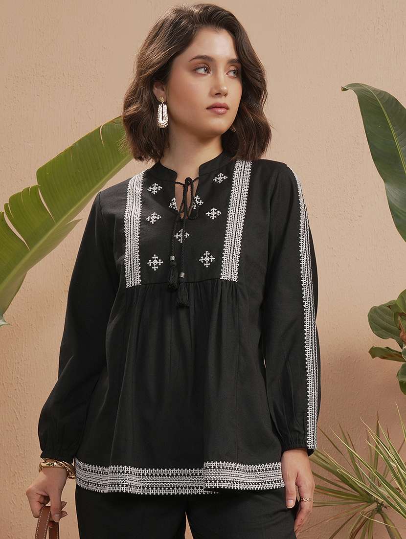 women embroidered long sleeves flared top