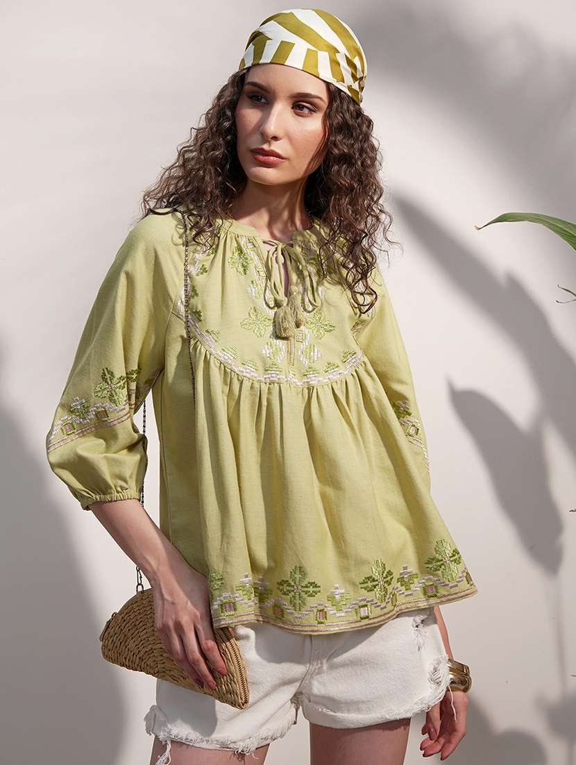 women embroidered tie up neck flared top