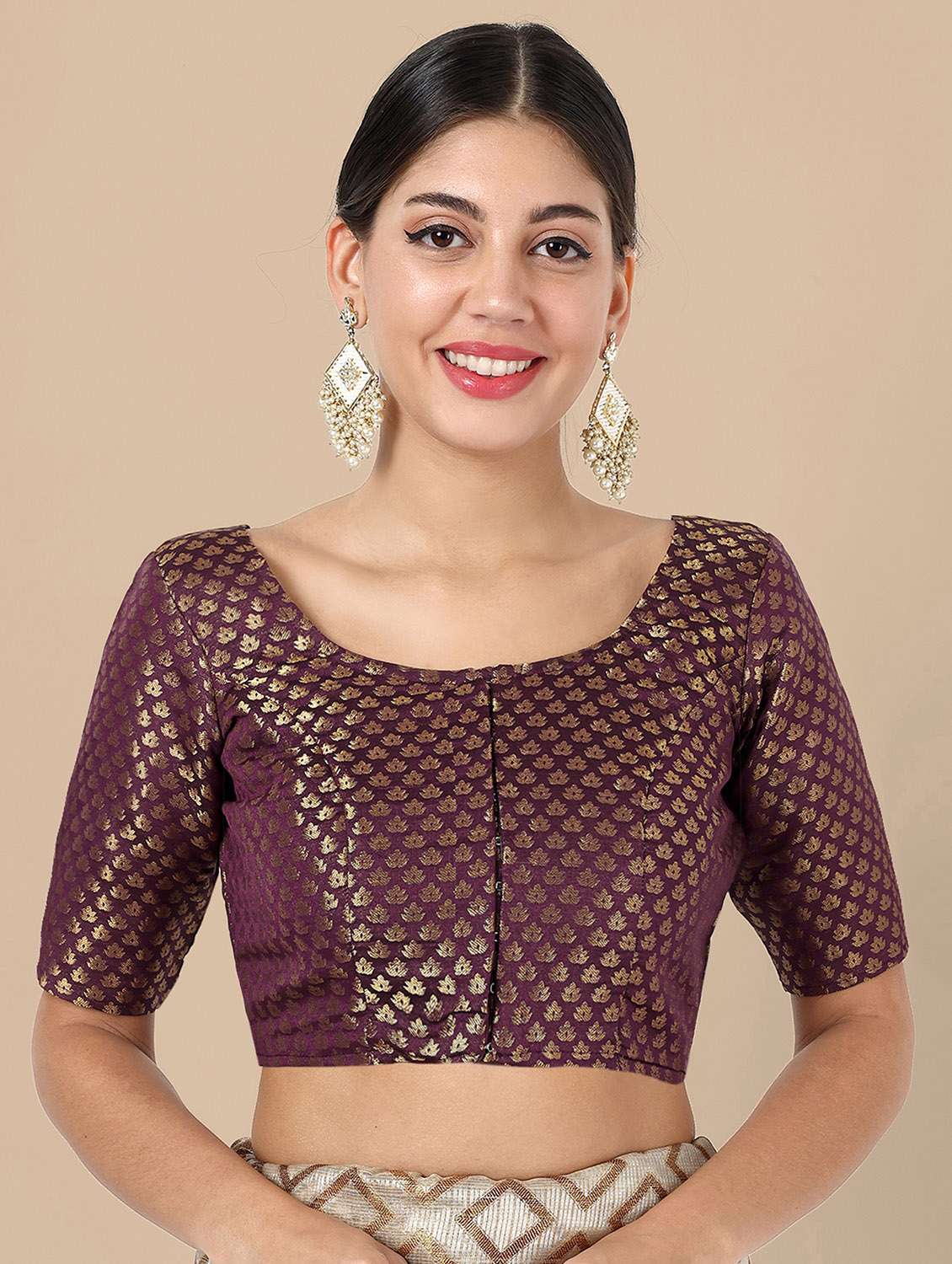 women self design round neck stitched blouse