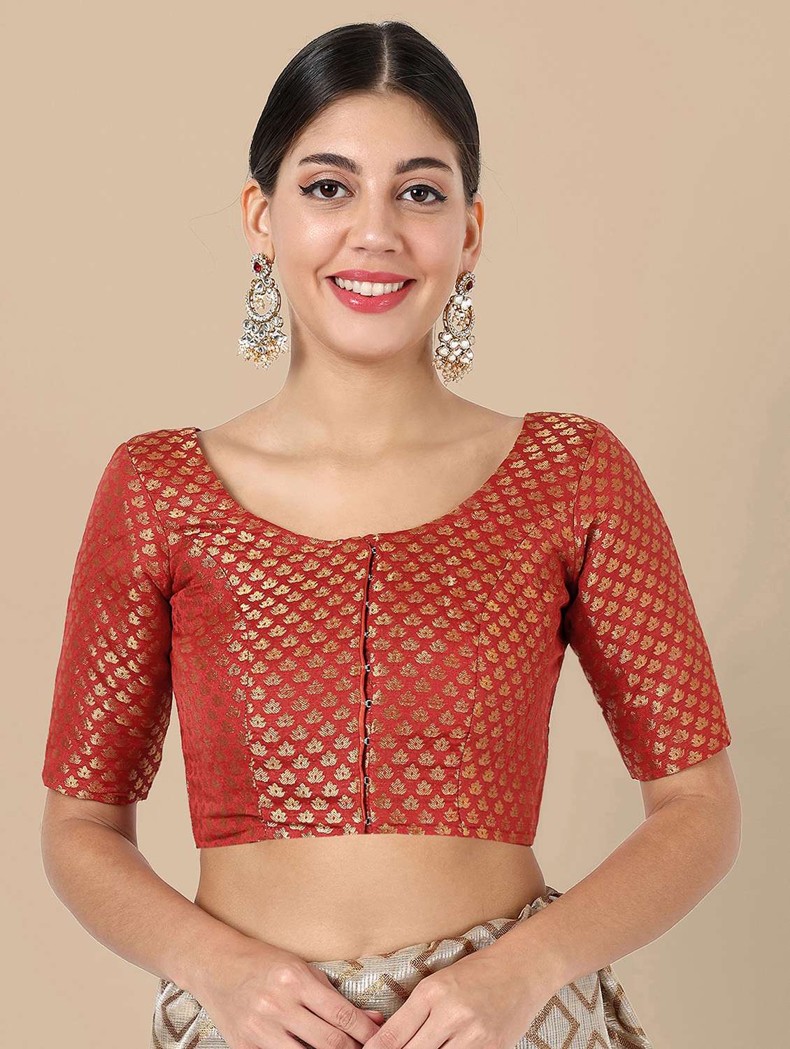 women self design round neck stitched blouse