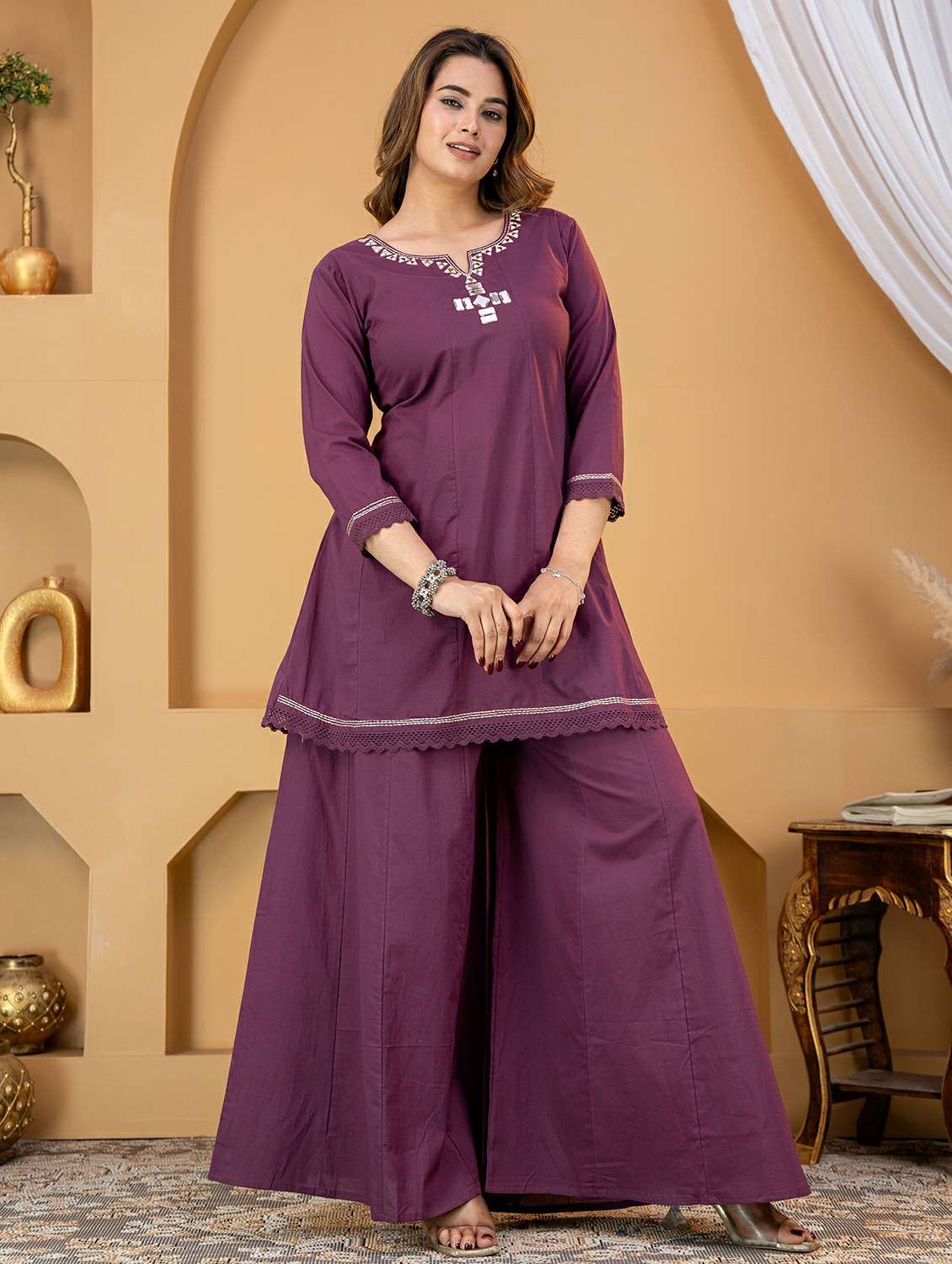 women embroidered notch neck kurta and palazzo set
