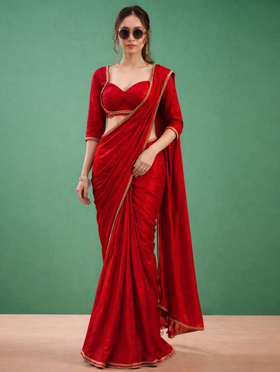 women solid with embellished bordered saree with blouse