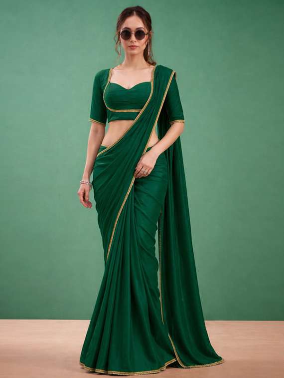 women solid with embellished bordered saree with blouse
