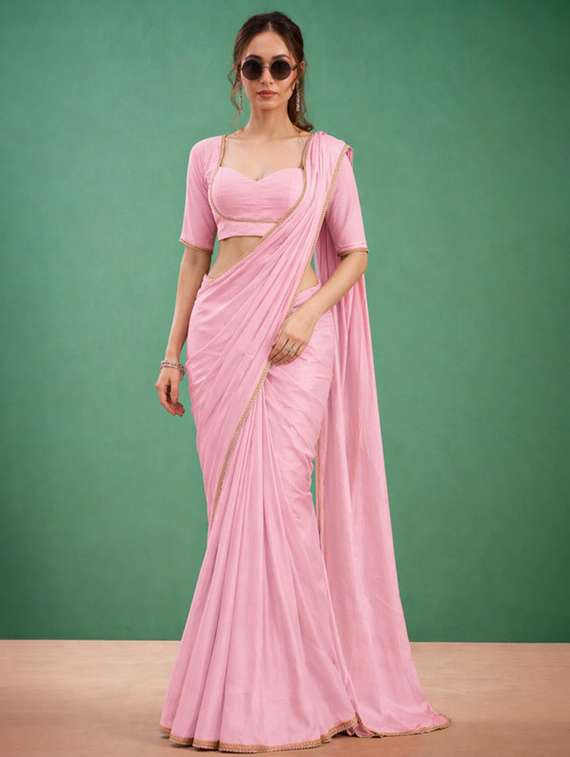 women solid with embellished bordered saree with blouse