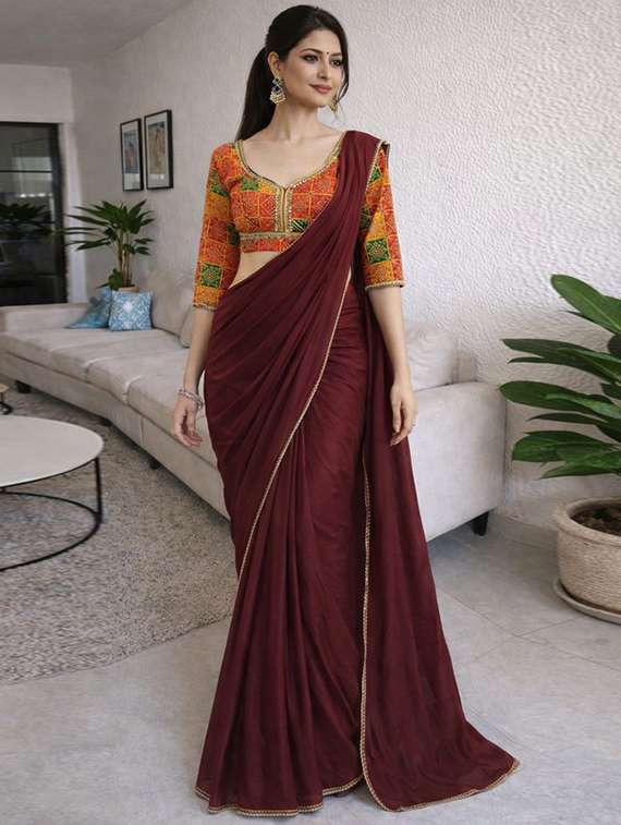 women solid with embellished bordered saree with blouse