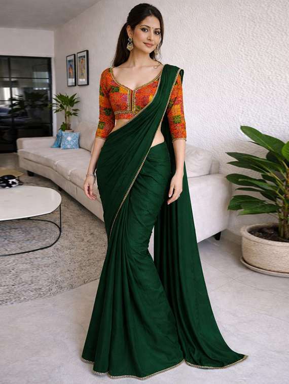 women solid with embellished bordered saree with blouse