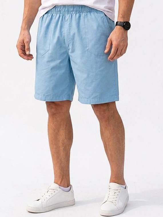men solid mid rise loose fit shorts