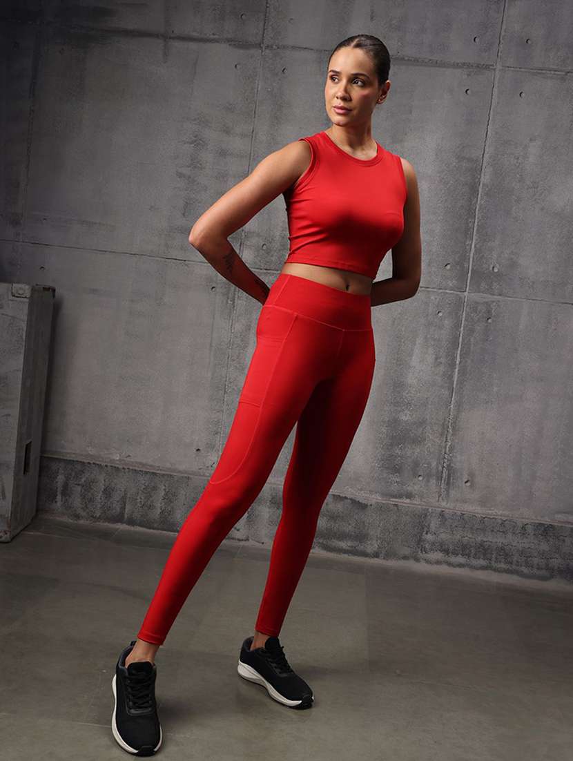 women solid sleeveless top and leggings active wear set